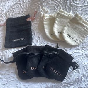 Authentic Pandora bags for charms, earrings, rings, and bracelets.  8 total.